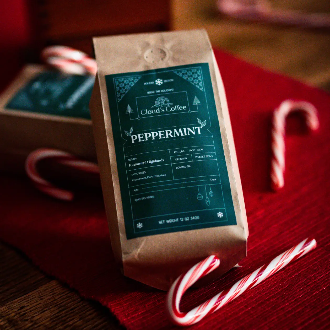 Branded coffee cup with Santa hat and lights